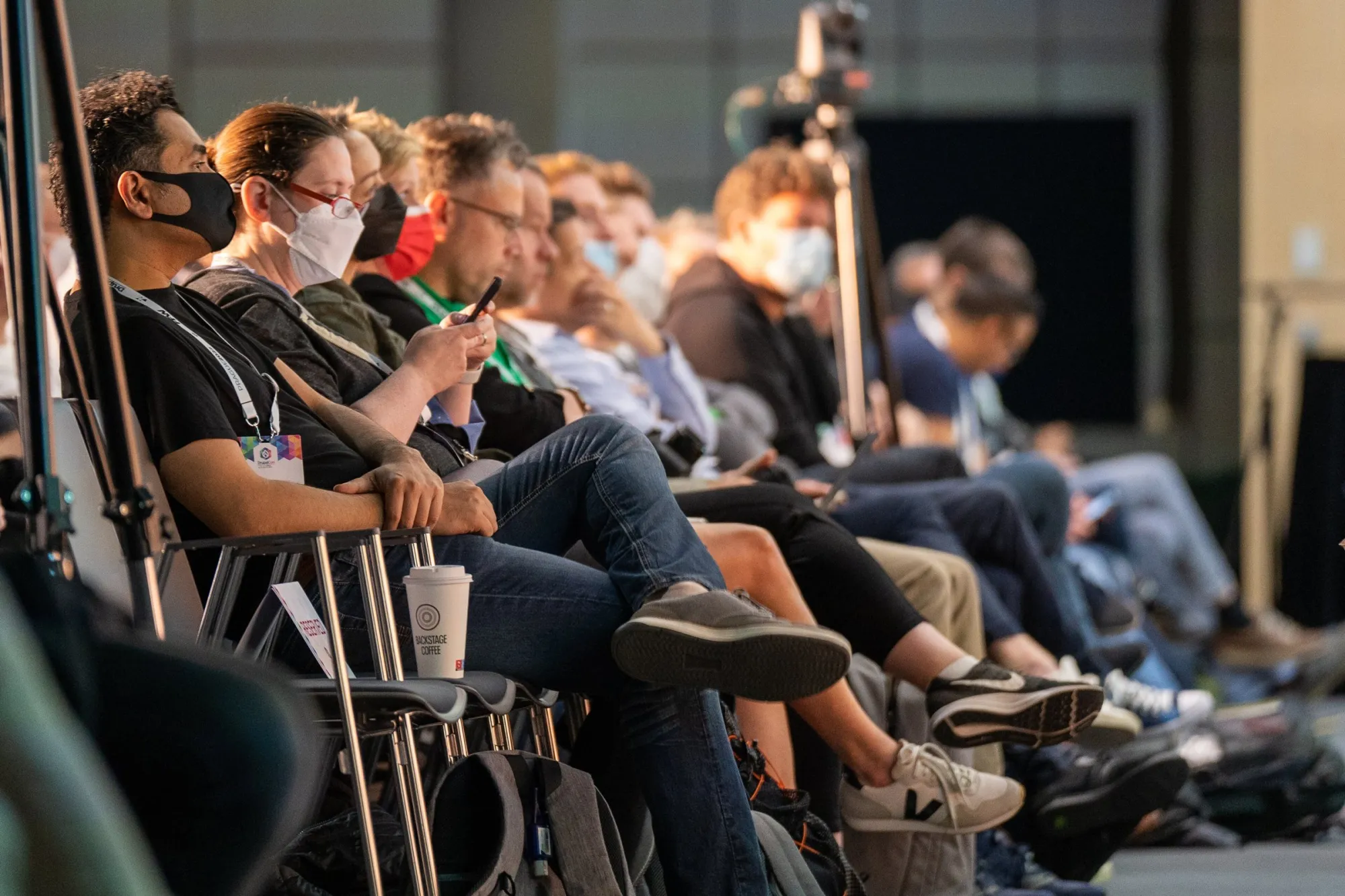 Attendees in the front rows of the opening keynote at DrupalCon Prague 2022