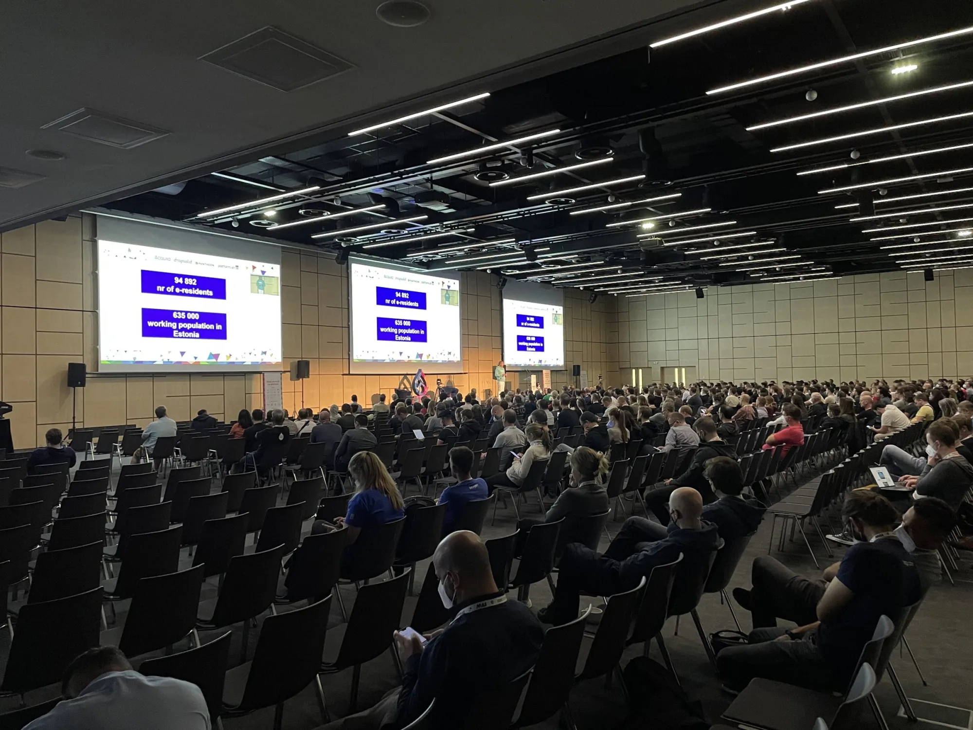A large audience in the main hall at DrupalCon Prague 2022